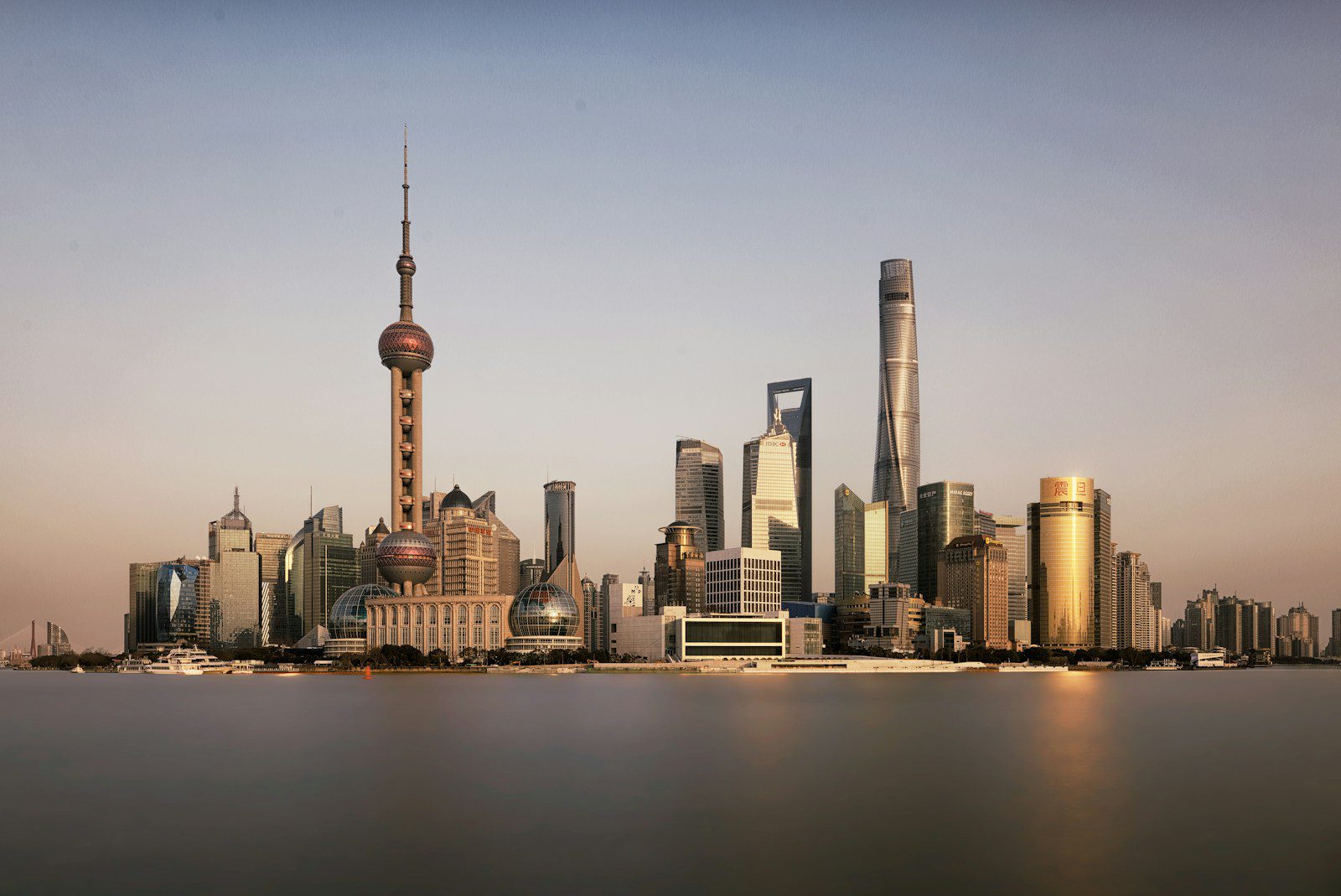 Shanghai’s skyline beside the Huangpu River at dusk